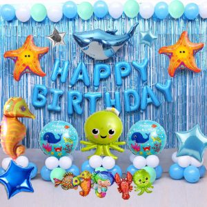 Underwater | Oceanic Dreams birthday decoration set featuring shark, octopus, sea horse foil balloons, light blue 'Happy Birthday' banner, and starfish foil balloons."