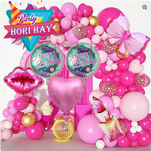 Barbie Party Setup at Home - "Barbie-themed party decorations at home with balloons, curtains, and accessories.